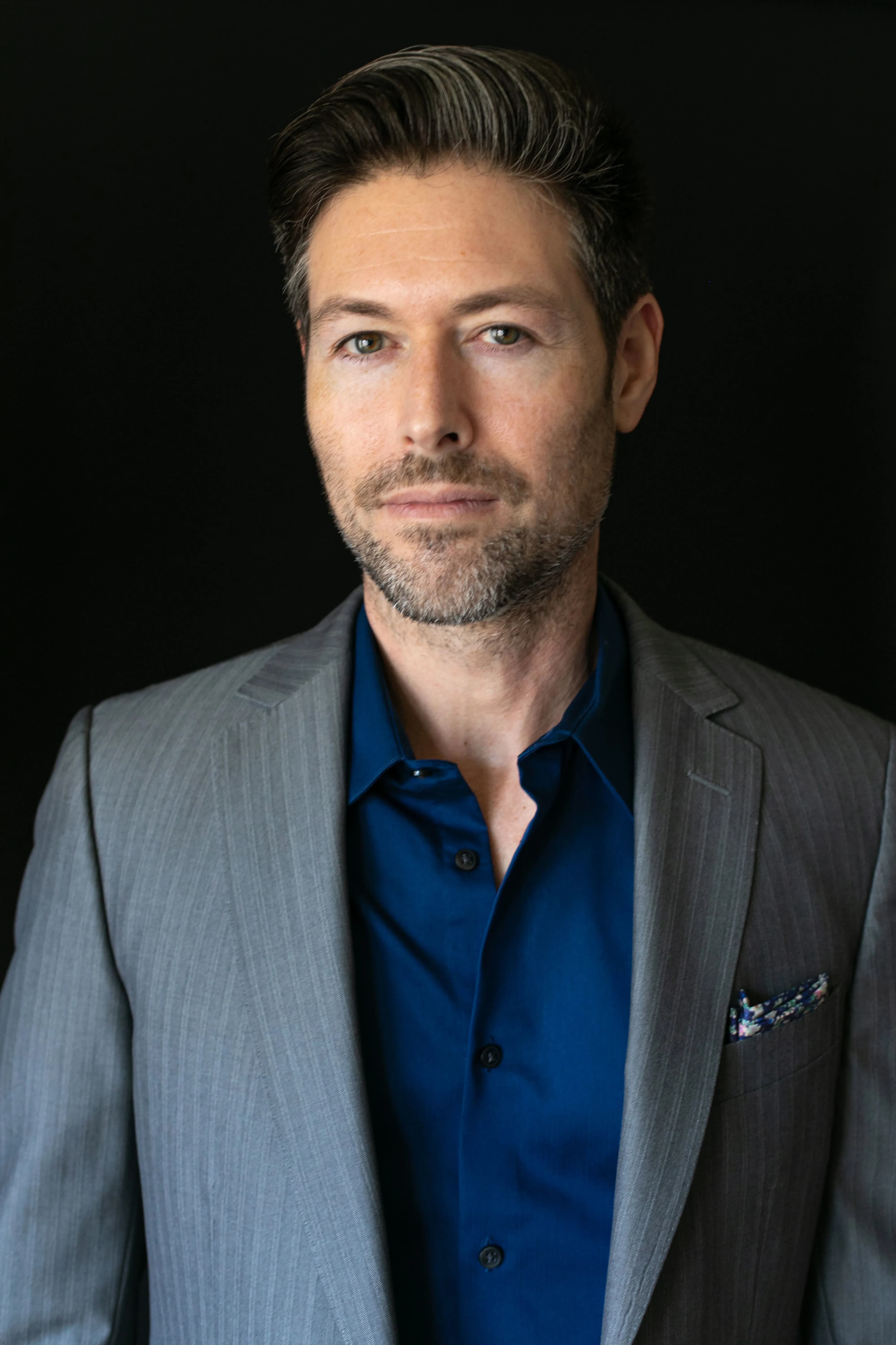 Michael in a grey suit